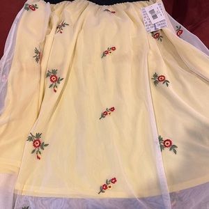 Beautiful yellow floral skirt with light embroidered overlay!